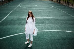 Image of woman on tennis court representing her private court